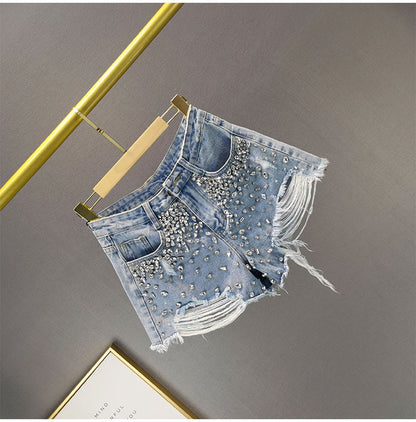 Mine - Zerrissene Jeansshorts mit weitem Bein