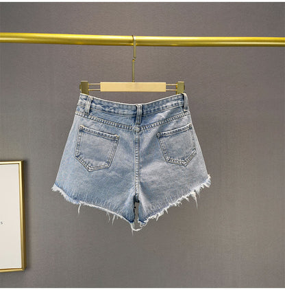 Mine - Zerrissene Jeansshorts mit weitem Bein